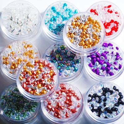 China Flatback 3D Mixed Color Crystal Pebble Beads Nail Jewelry Ornaments Nail Beauty Decoration for sale