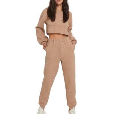 China Anti-pilling new in casual sweat suit structured waffle fabric cropped sweater jogger set women 2 piece set for sale