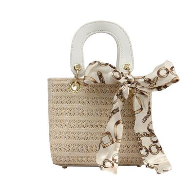 China Fashion classic style woven straw bag bucket bag wholesale Korean version of the wave of the simple fashion beach bag for women for sale