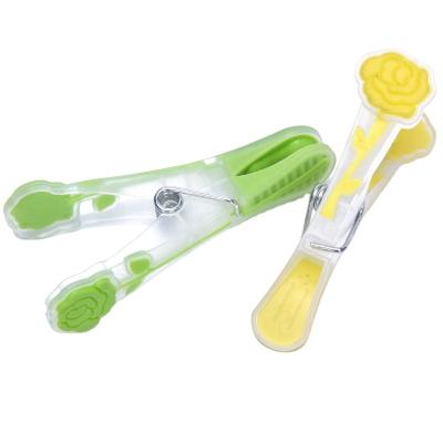 China Drying Eisho Outdoor Design A Clothes Plastic Peg Clothespin Soft Grip Pegs Transparent For Clothes for sale