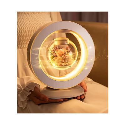 China Modern Preserved Bouquet Rose Dried Flowers Valentine's Day Gift Box Flower Magnetic Levitation Birthday Gift Table Lamp for sale