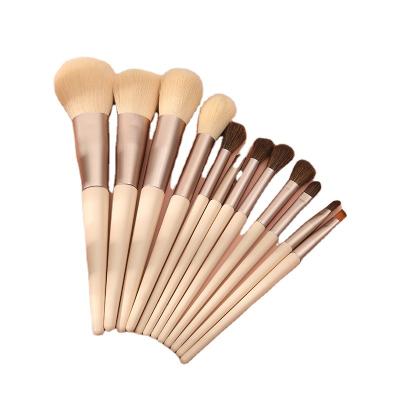 China Custom Makeup Brush OUMO12pcs Light Pink Wholesale Synthetic Hair Vegan Makeup Brush Set With Box Private Label Makeup Brushes for sale