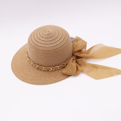 China Summer Straw Hat Customize Latest Paper Straw Beach Hat Large Character Ladies Eaves Beach Hat Bowknot for sale