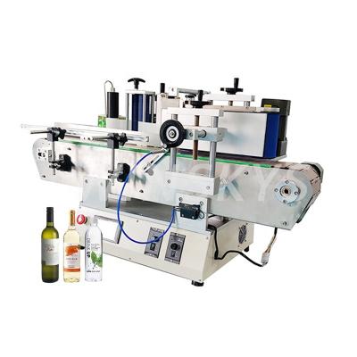 China Factory Automatic Adhesive Equipment Container Water Food Desktop Round Bottle Labeling Machine for sale