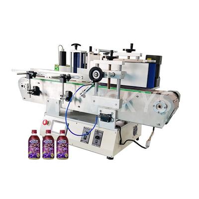 China Mini round food cosmetic tube spices jerry can bottle adhesive labeling machine for round container for sale