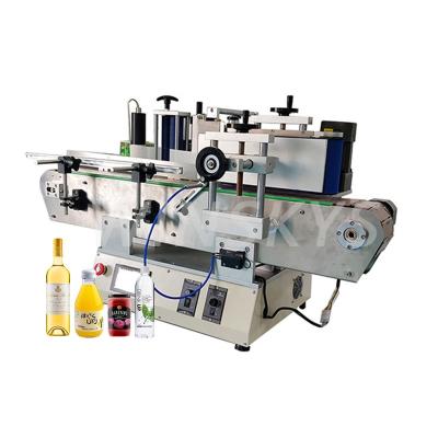 China WINSKYS Automatic Food Water Top Cans Water Wine Beverage Oil Round Bottle Sticker Labeling Machine for sale