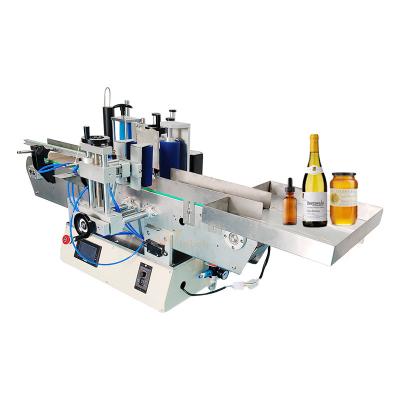 China Food Placing Bottle Automatic Tabletop Sticker Glass Tube Jar Essential Oil Round Applicator 3 Roll Labeling Machine for sale