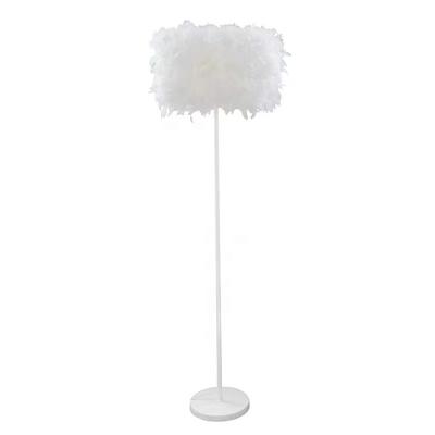 China Dropshipping Modern Nordic Modern Heat LED Feather Floor Lamp Wedding Guide Light For Bedroom for sale