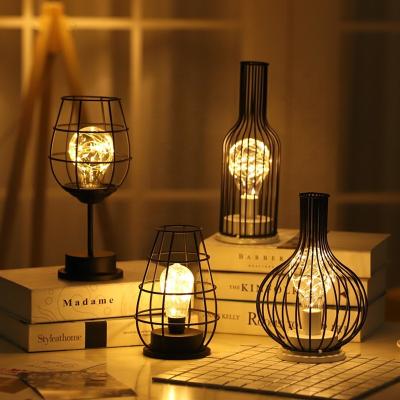 China Sci-Fi Christmas Decoration Metal Frame Cage Iron Wine Bottle Circular Night Light for sale