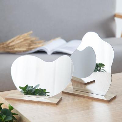 China The Custom Style Acrylic Makeup Mirror Korean Irregular Decorative Wooden Bottom for sale