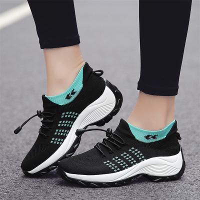 China Cushioning Stylish Women Walking Thick Knitting Unique Air Cushion One Foot Fitness Sneakers Walk Sports Shoes for sale