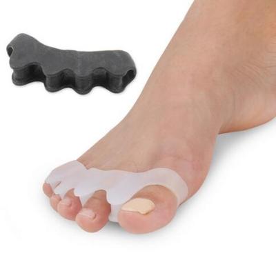 China Silicone Gel Toe Stretcher Hallux Valgus Foot Care Protector Gel Toe Separators for sale