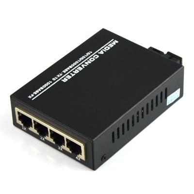 China High Quality FTTH 10/100/1000M Manufacturer Price SC 1G4E 3KM 1 Fiber 4 Port Rj45 Gigabit Fiber Optic Media Converter for sale