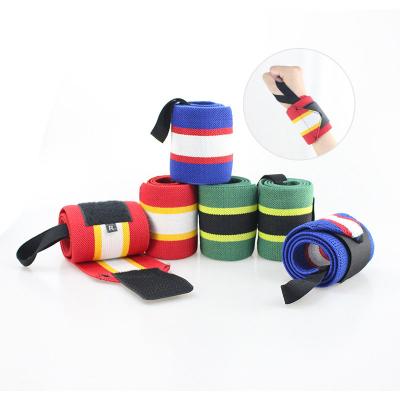 China Breathable Gym Fitness Heavy Duty Weightlifting Sports Compression Wrist Brace Support Weightlifting Wrist Wraps for sale