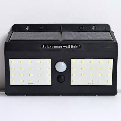 China Outdoor 10w Motion Sensor Solar Garden Grape Wall Light Solar Led Wall Light Waterproof for sale