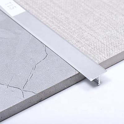 China Wholesale Alloy 6063 Misumi Custom 15mm T-Shape Aluminum Floor Dividing Cover Strips Flexible Use Protective Edge Trim for sale