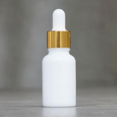 China Personal care china cosmetic white essential oil bottle with dropper/essence opal glass oil bottle for sale