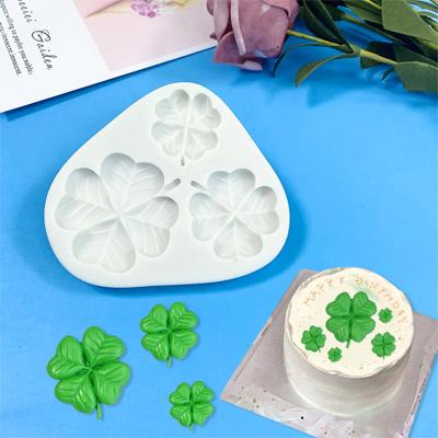 China Sustainable DIY Cake Decorating Promotional Chocolate Baked Lucky Leaf Drop Glue Ornament Four Leaf Clover Fondant Silicone Mold for sale