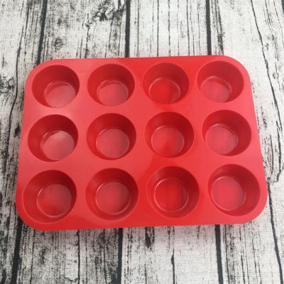 China 100% Sustainable Food Grade Non-Stick Silicone Baking Molds12 Cup Round Shape Silicone Muffin Cupcake Baking Pan Muffin Cupcake Tray for sale