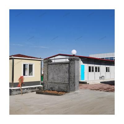 China Panel House Prefabricated House Cheap Price Glass Wool Rock Wool EPS Sandwich Panel Wall Single Slope Roof for sale