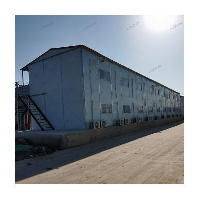 China Sandwich House Prefab Home Ready Made Prefabricated Double Slope Roofing Good Wind Resistance for sale