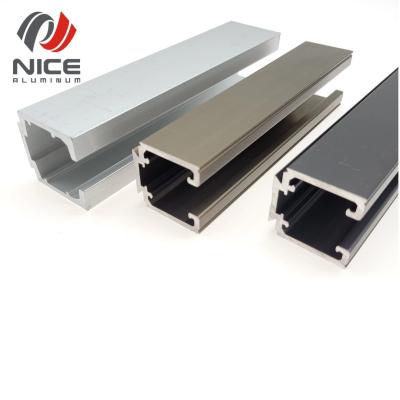 China Modern Extrusion Profile Price Aluminum Sliding Door Railing Roller Door Guide Rail for sale