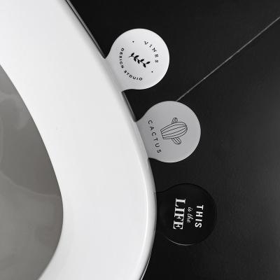 China Hygiene Push Cover Durable Hot Toilet Seat Cover Handle Foldable Bathroom Clean Items Avoid Touching Toilet Seat Lift Handle for sale