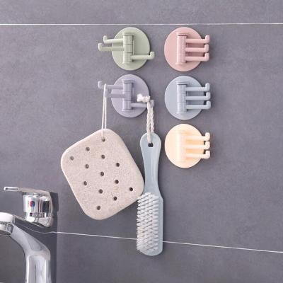 China Hot 3 Hooks Wall Hooks Household Items Bathroom Rotating Plastic Kitchen Tools Rotation Multifunctional Towel Adhesive Hanging Hook for sale