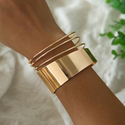 China Custom Shiny Polished Gold Geometry Cuff Fashion Punk Bangle Women Indian Bangles for sale