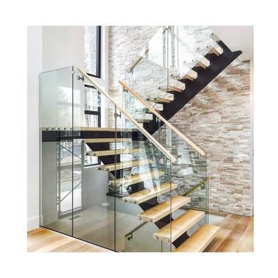 China Stringer Wood Tread Curved Floating Modern Cantilever Invisible Staircase for sale