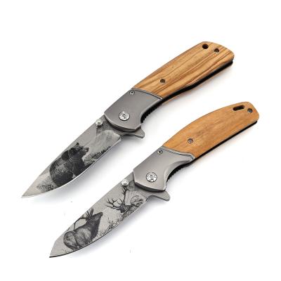 China Slide Open Titanium 3d Blade Coated Knife Hunting Survival Knife Tactical Camping Tools Folding Pocket Knife Wood Handle Outdoor Wholesale for sale