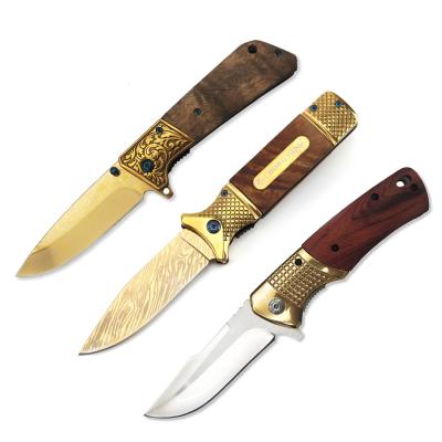 China Non-variable king's gold pocket knife with wooden handle unique handmade folding knife other camping and hiking products wholesale for sale