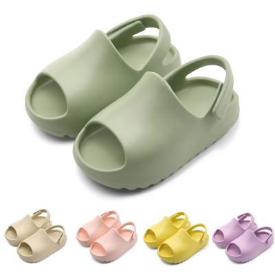 China Wholesale round kids pour sandal colorful cute EVA slippers kids clogs shoe yeezy slide strap slides yezzy water infant shoes for sale