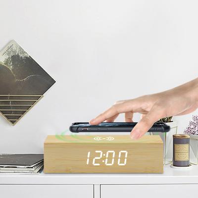 China Class Modern Hotel Rectangle Alarm Clock Led Digital Table Mobile Phone Qi Wireless Charging Bamboo Clock for sale