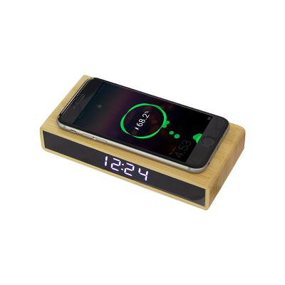 China Mobile Phone Green Bamboo Material Wireless Charger Digital Display Clock Timing Reminder 5W Multifunctional Power for sale