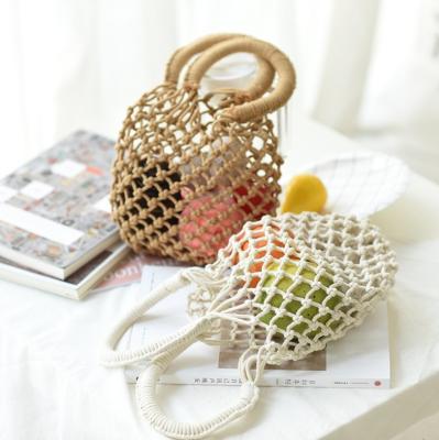 China 2021 New Fashion Style Women Vacation Beach Pocket Net High Quality Woven Handbags Straw Bag for sale