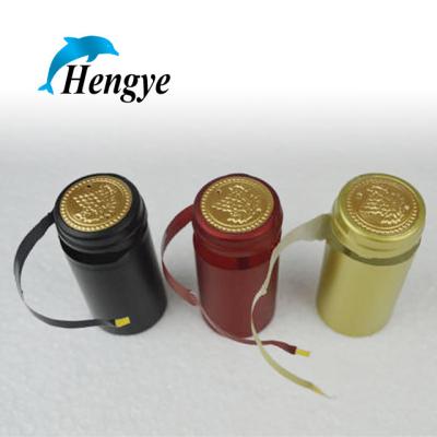 China Durable Wine Bottle Shrink Caps PVC Heat Shrink Capsule Anti Slip Embossed for sale