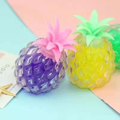 China Anti Stress tpr TONGLE Squeezable Spinner Toy Large Eco-friendly Soft Rubber Fruit Pineapple for sale