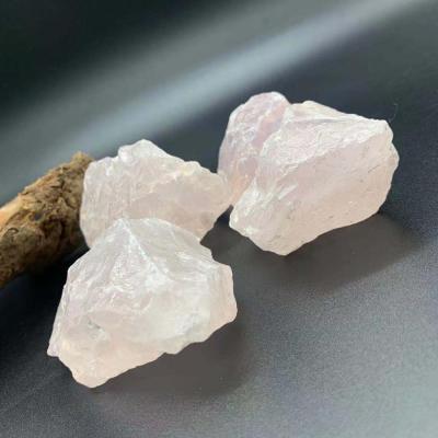 China Europe natural crystal rose shape free raw gemstone rose quartz crystal stone crafts for decoration for sale