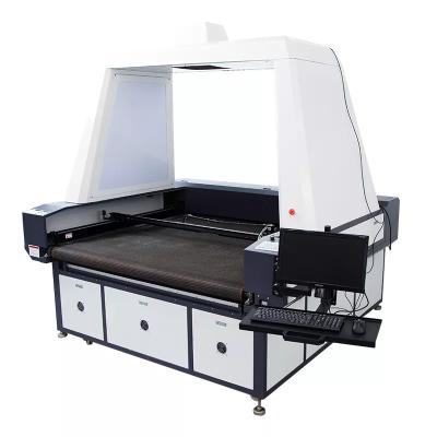 China Water-cooled NBS1812 camera laser cutting machine auto feeding fabric leather cloth laser cutter cutting machine for garment industry for sale