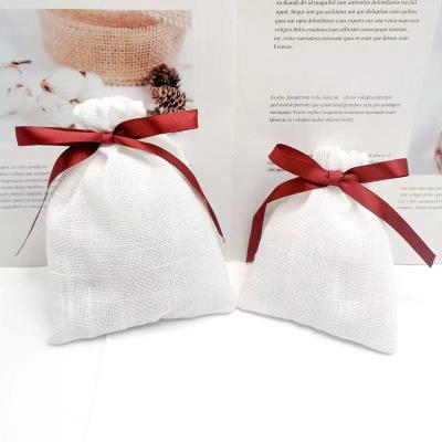 China Luxury Canvas Weeding Small Drawstring Gift Cotton Jewelry Bag Cotton Pouch Muslin Jewelery Bag with Black Ribbon for sale