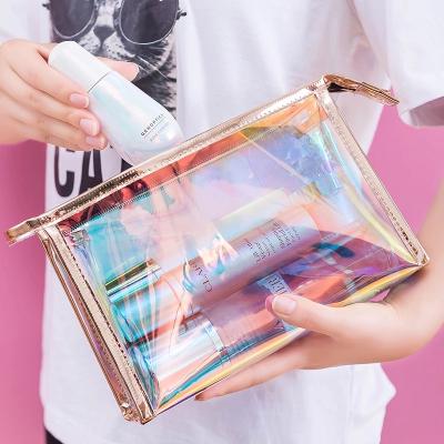 China Custom Laser Transparent Waterproof Clear Bag Storage Makeup Travel Holographic PVC Holographic PVC Cosmetic Bag for sale