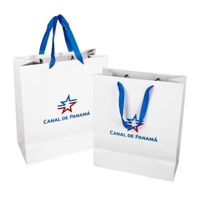 China Recyclable Custom Logo Foil Printed White Gift Paper Shopping Bag With Logo for sale