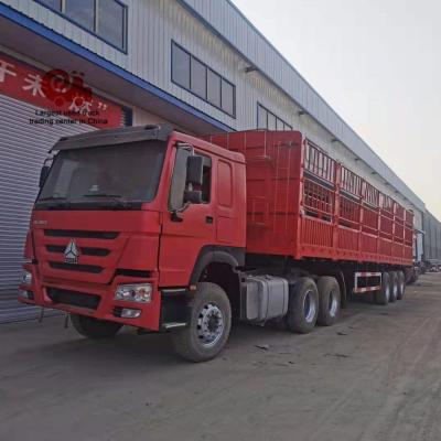 China Truck Trailer 100 Ton Livestock Trailer 3 Axles Sugarcane Cargo Transport Stake Barrier Semi Trailer Animal Truck Trailer for sale