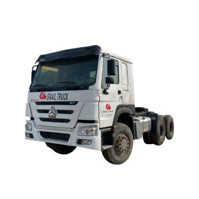 China Left hand drive howo tractor head LHD Sinotruck used tractor trucks for sale 6800x2496x3200mm for sale