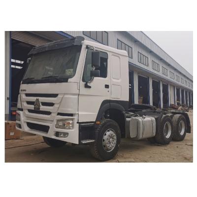 China Right Hand Drive Tractor Head RHD Sinotruk Used Tractor Trucks 6800x2496x3200 for sale