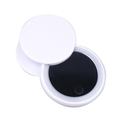 China Hot Lighted Turned Small Pocket Portable Led Mirror Lights Travel Mirror With Power Bank for sale