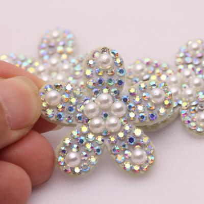 China Flatback crystal white flower ab sew rhinestone patch past on fabric rhinestone applique for wedding elegant shoes bags decoration for sale