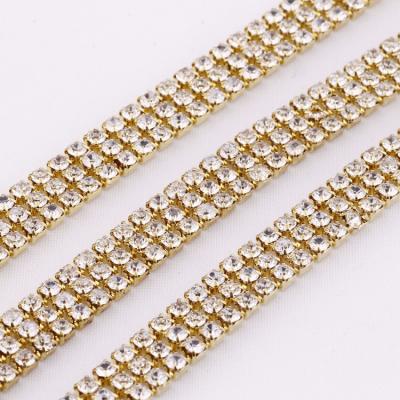 China Flatback 3 Rows SS12 Crystal AB Glass Rhinestone Cup Chain With Claw Gold Base Rhinestone Trim For DIY Clothes Dress Decoration for sale