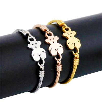 China CLASSIC women fashion classic jewelry adopt stainless steel cuff bracelet bear charm gold plated bangle for sale